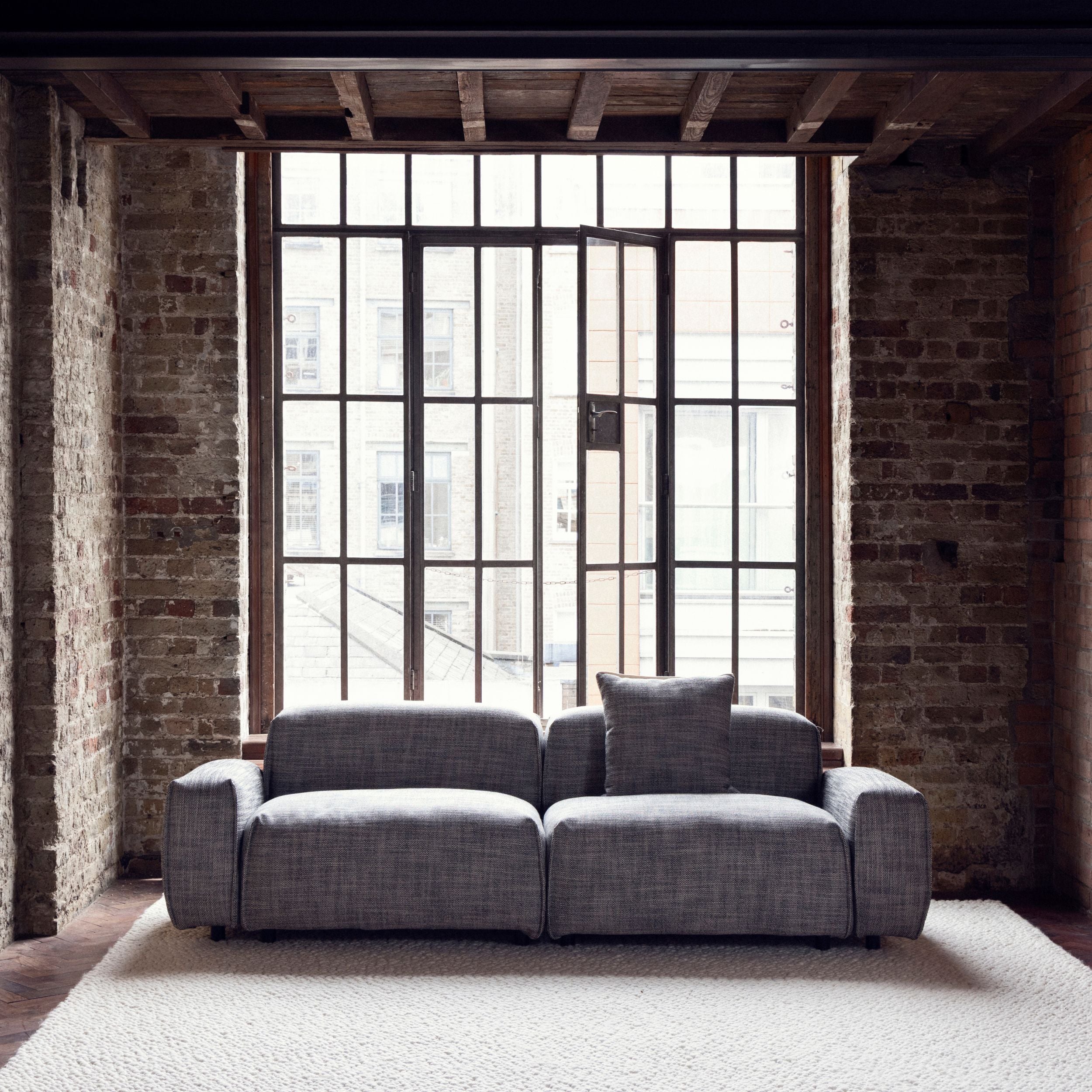 Cozmo Sofas - Float 3 Seater Sofa - Salt & Pepper Textured Weave - Black Legs - Detail view