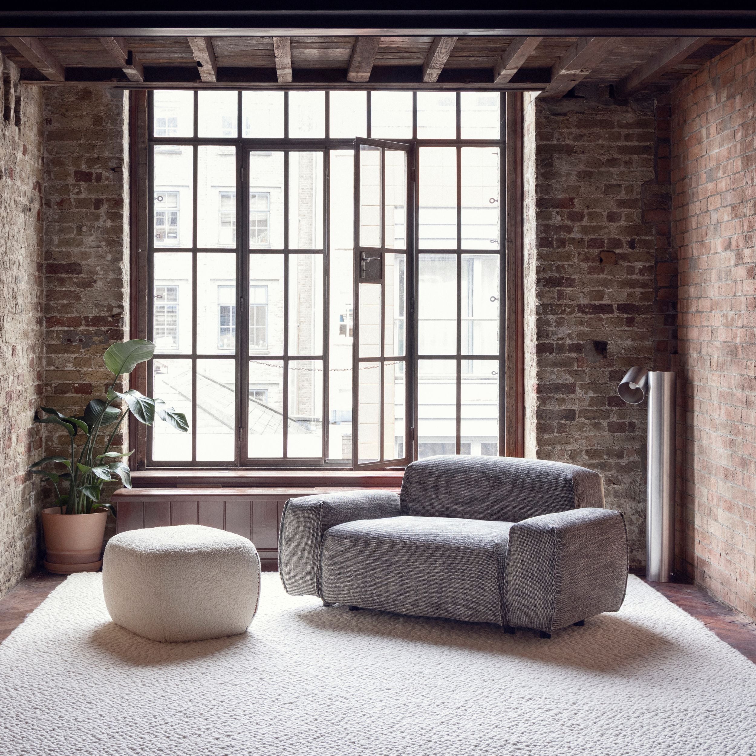 Cozmo Sofas - Float 1.5 Seater Sofa - Salt & Pepper Textured Weave - Black Legs - Detail view