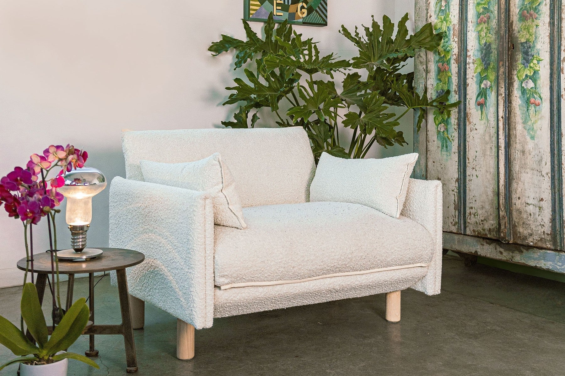 Cozmo Sofas - Cozy 1.5 Seater Sofa - Black Boucle - Natural Legs - Lifestyle view