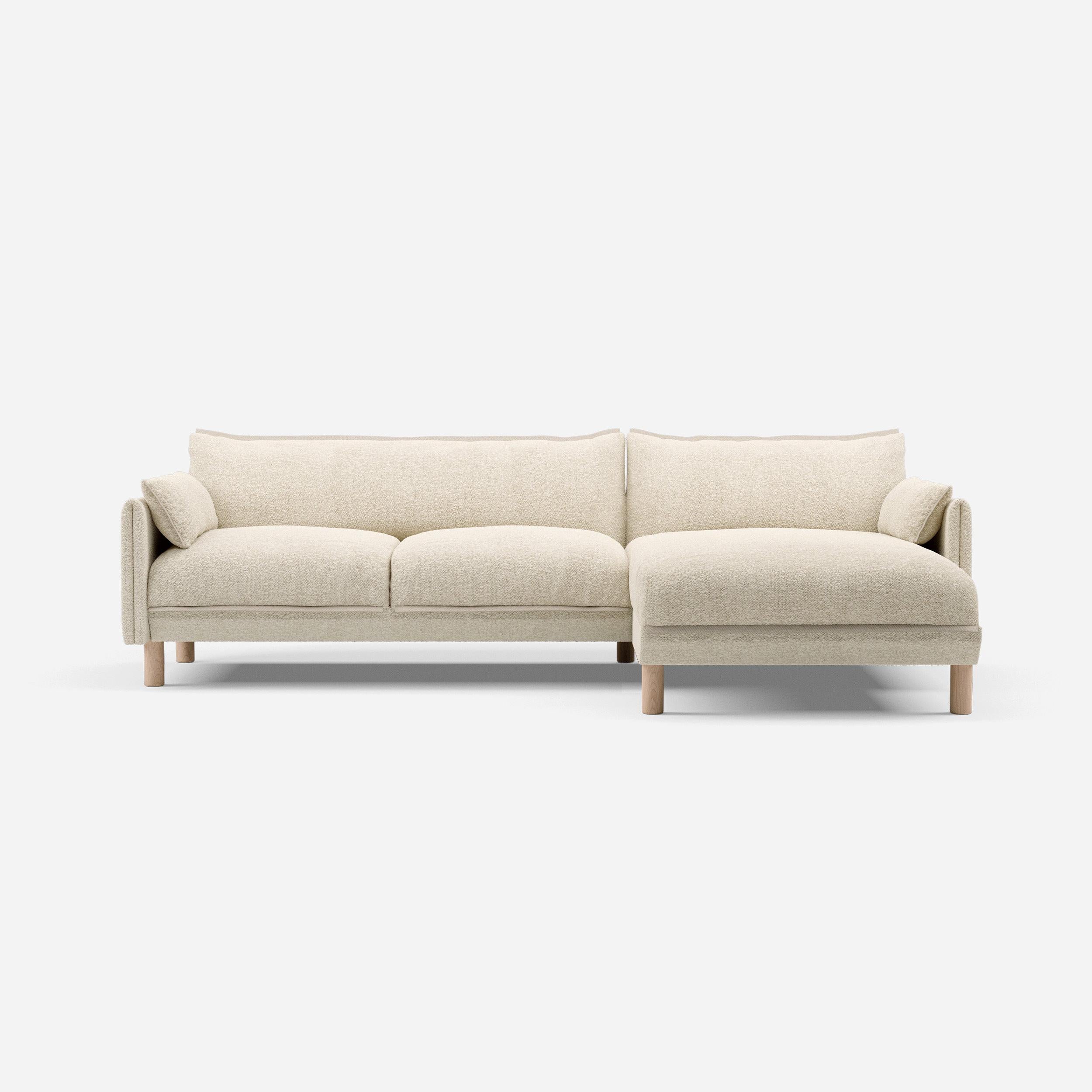 Cozmo Sofas - Cozy 4 Seater RH Chaise Sofa - Ecru Boucle - Natural Legs - Side angle view