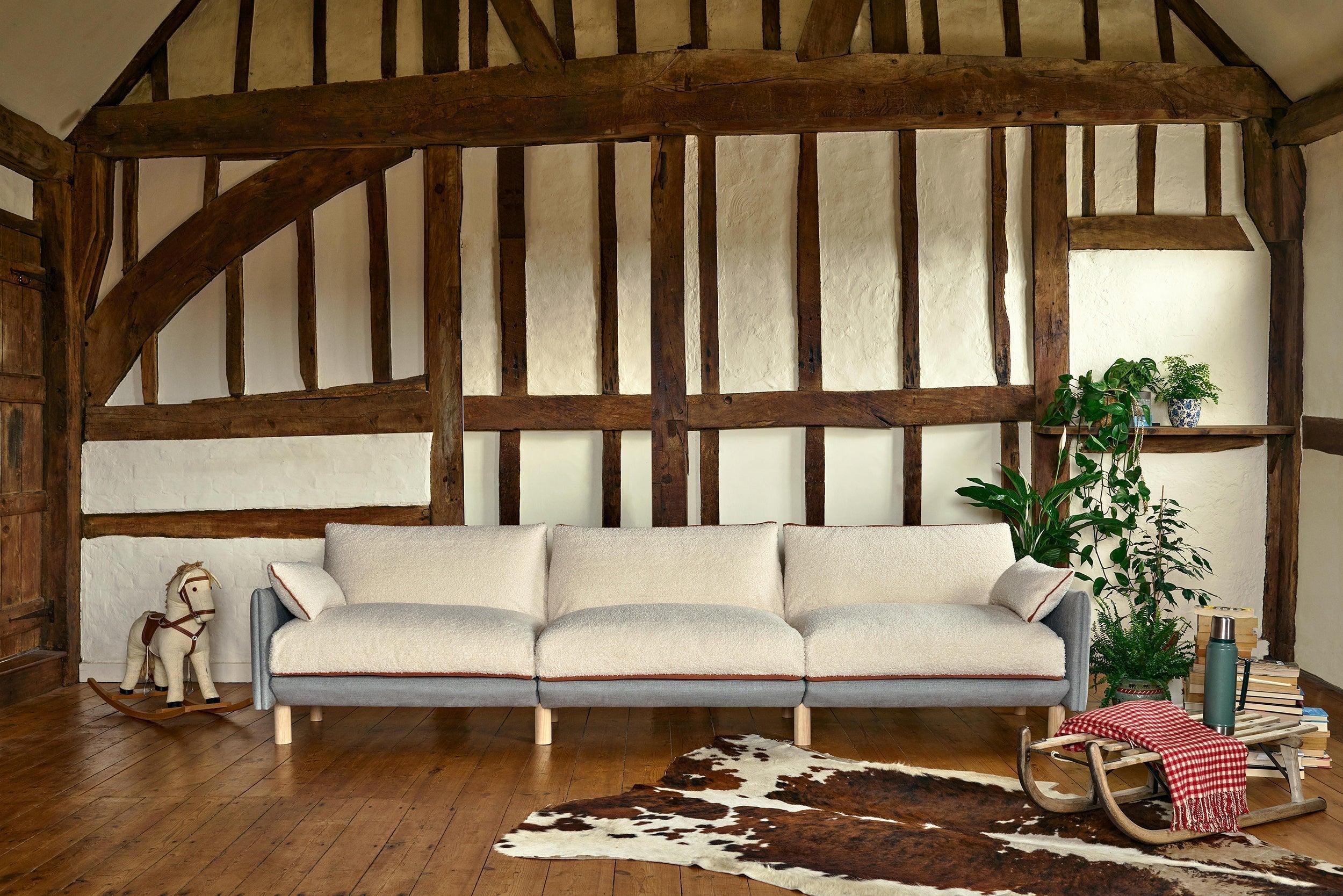 Cozmo Sofas - Cozy 5 Seater Sofa - Black Boucle - Natural Legs - Lifestyle detail