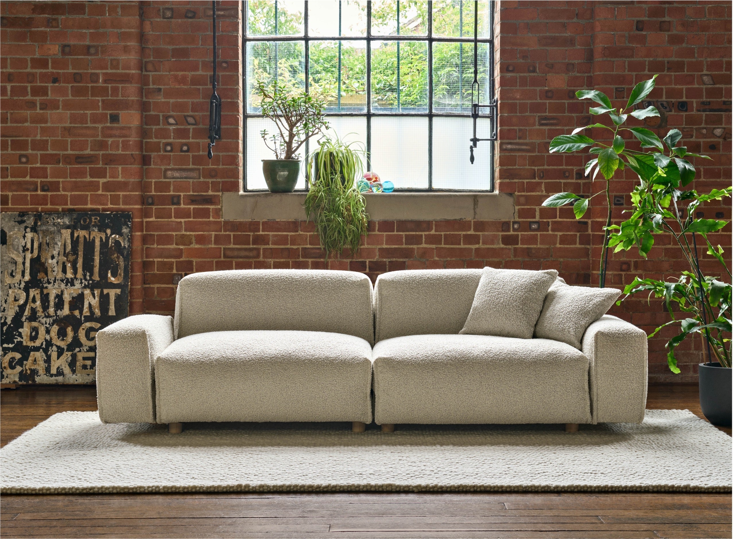 Cozmo Sofas - Float 3 Seater Sofa - Cream Textured Weave - Black Legs - Lifestyle view