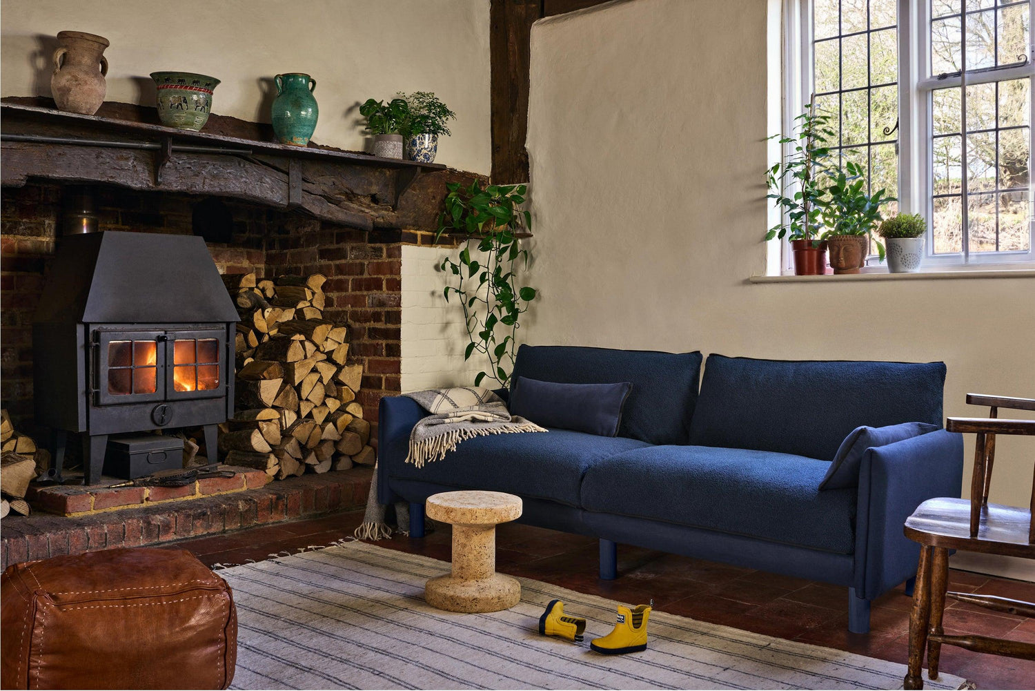 Blue 3 seater cozmo sofa in a warm interior