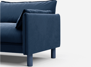 3 seater cozmo sofa velvet midnight blue with velvet midnight blue jacket front 1/3 angled view @ Midnight Blue Velvet Jacket | Dark Blue Trim