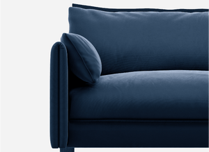3 seater cozmo sofa velvet midnight blue with velvet midnight blue jacket front 1/3 view @ Midnight Blue Velvet Jacket | Dark Blue Trim